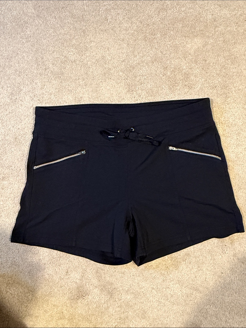 Athleta black women's athletic shorts with zip pockets